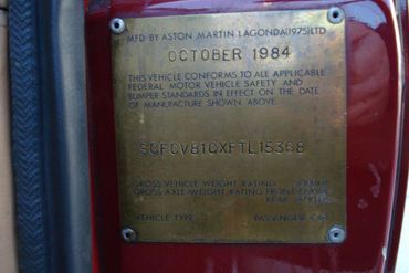 27457