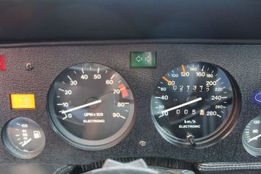 113210