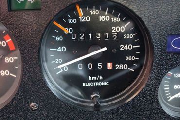 113211