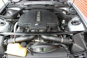 100832