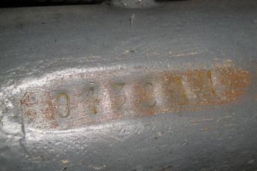 37057