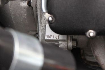 77111