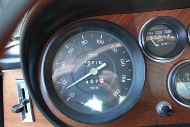57076