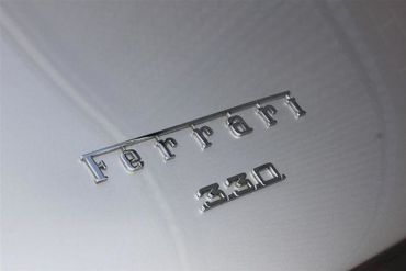 77561
