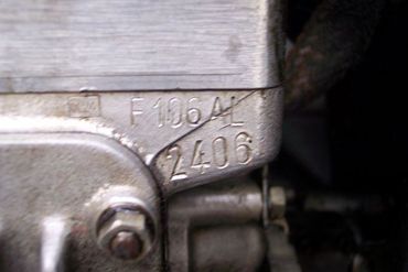 14077