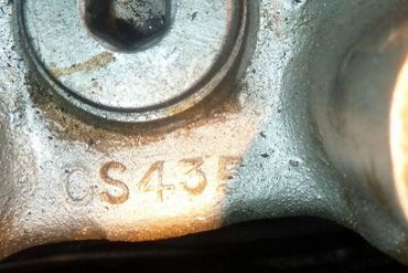 77001