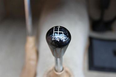 76947