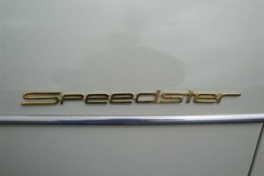 38115
