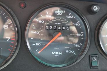 77210